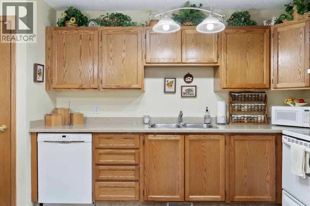 Single Family House Bungalow for Sale in  Arbour Cliff Close NW Arbour Lake Calgary 