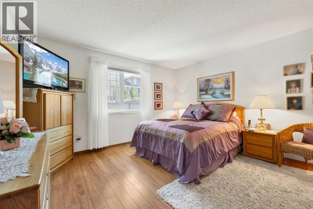 Single Family House Bungalow for Sale in  Arbour Cliff Close NW Arbour Lake Calgary 