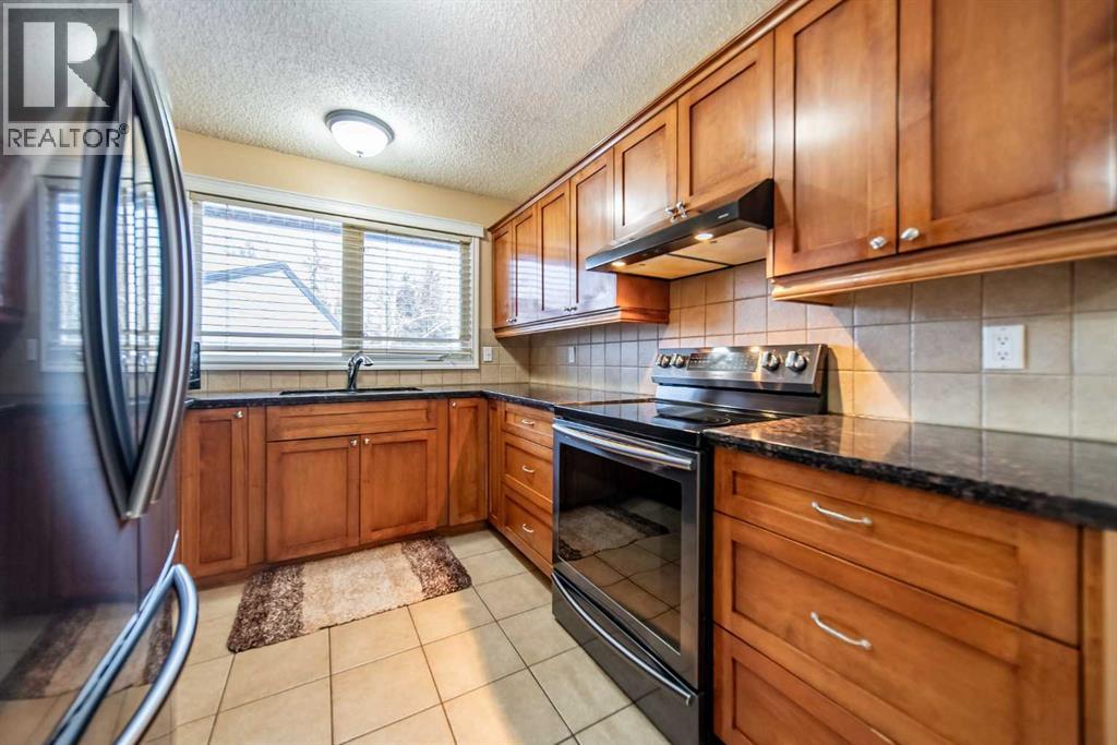 Single Family House 5 Level for Sale in  Ranchview Crescent NW Ranchlands Calgary 