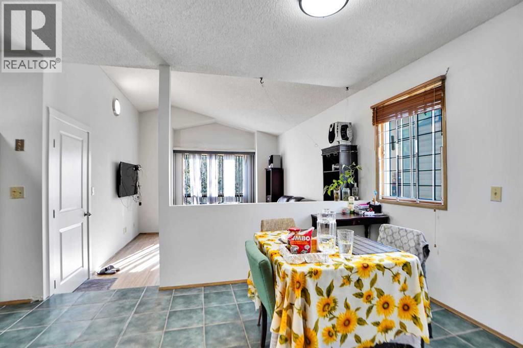 Single Family House Bi-level for Sale in  Erin Park Drive SE Erin Woods Calgary 