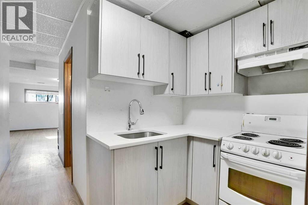 Single Family House Bi-level for Sale in  Erin Park Drive SE Erin Woods Calgary 