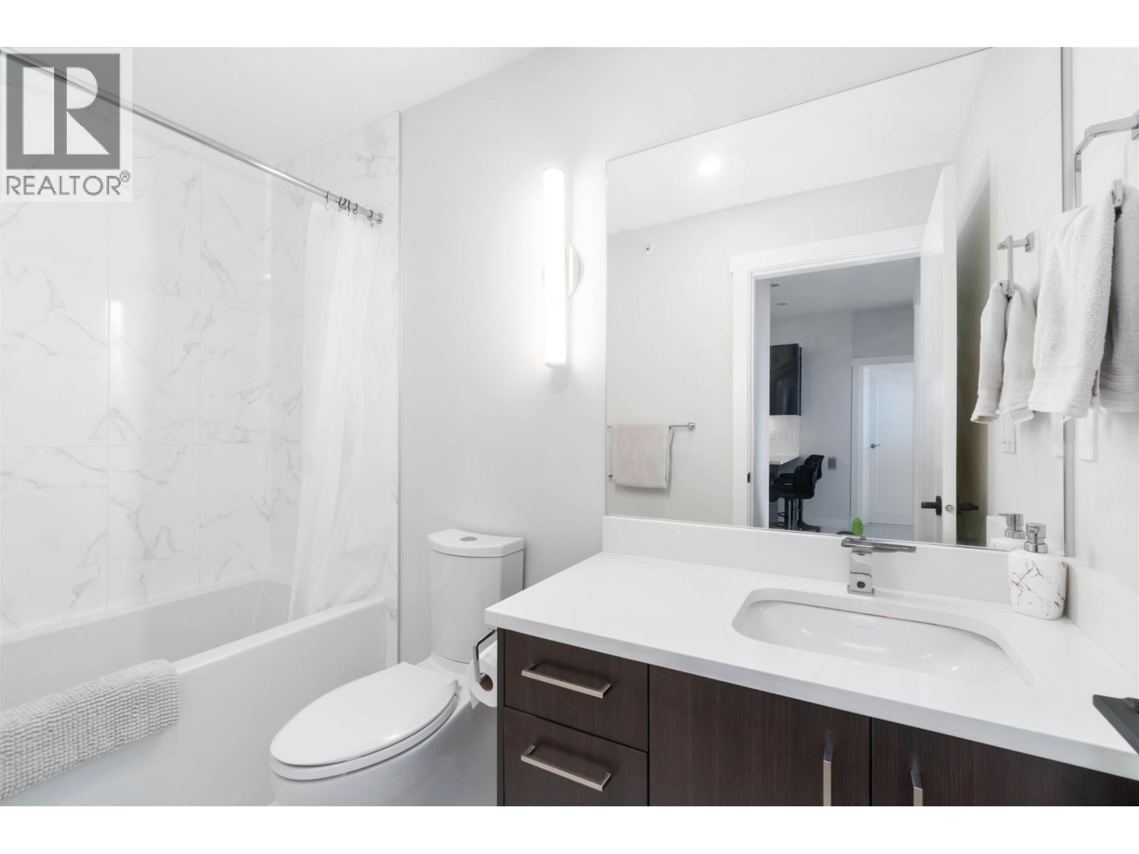 409 1633 TATLOW AVENUE, North Vancouver