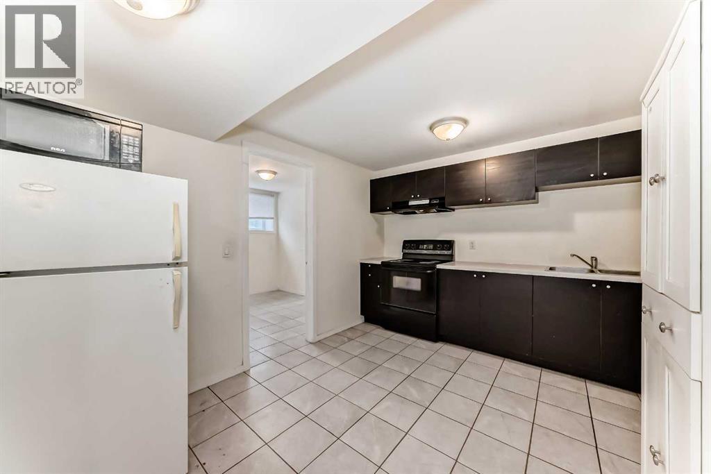 Multi-family House Bungalow for Sale in   Street NW Collingwood Calgary 