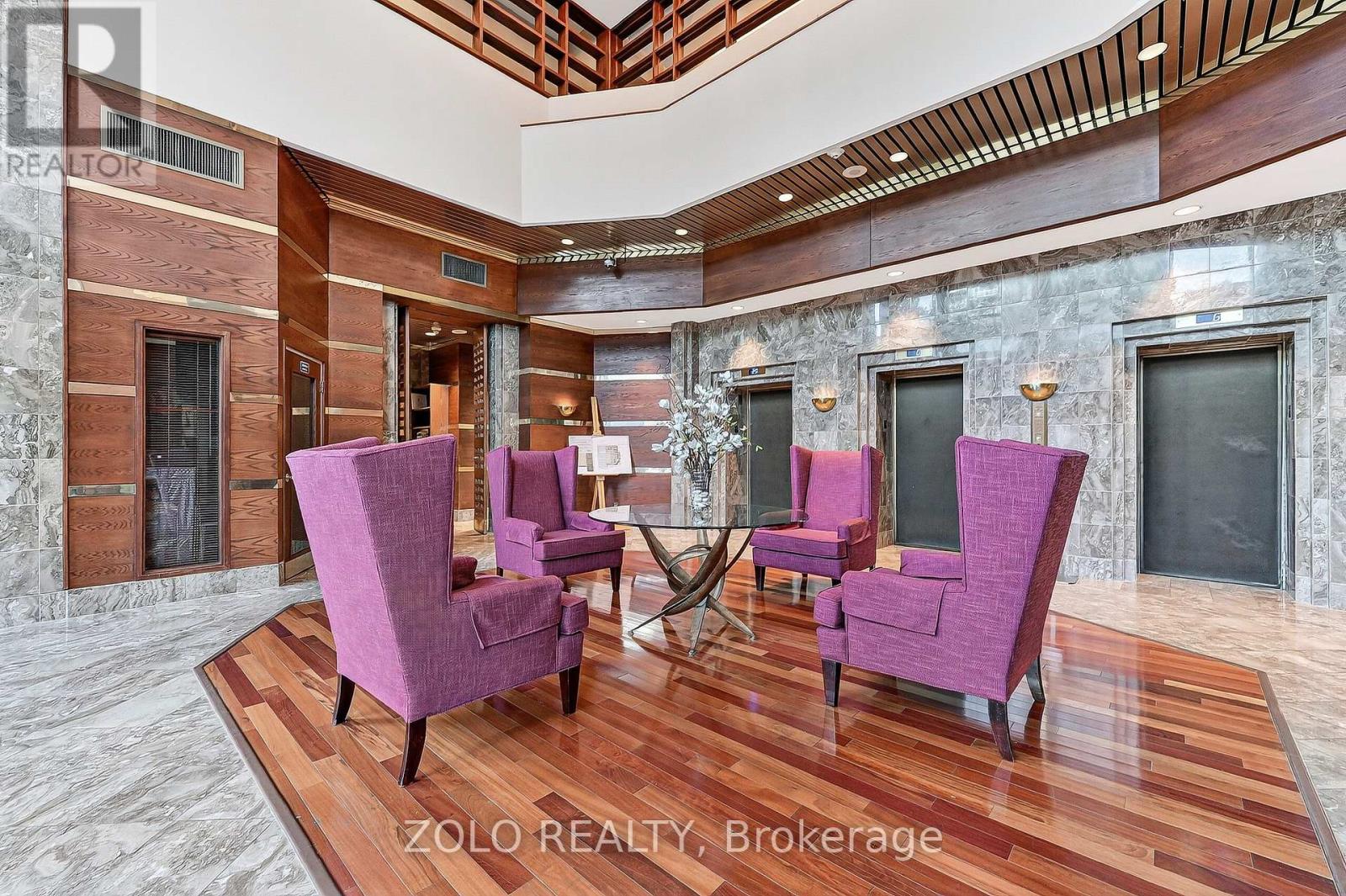 Main lobby area with elevators in backdrop.