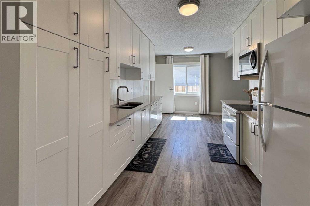 Single Family House Bungalow for Sale in  Sunhurst Court SE Sundance Calgary 