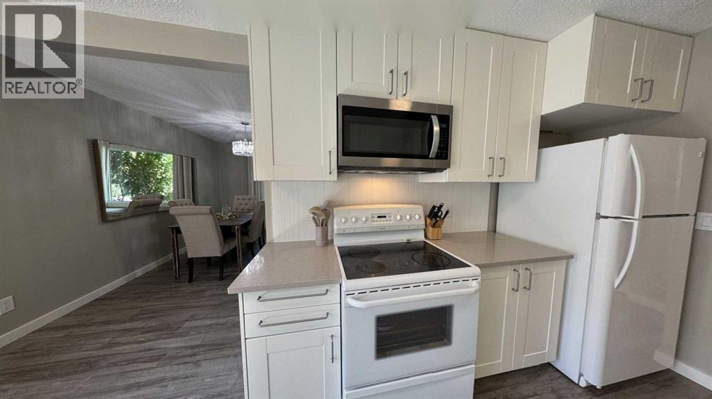 Single Family House Bungalow for Sale in  Sunhurst Court SE Sundance Calgary 