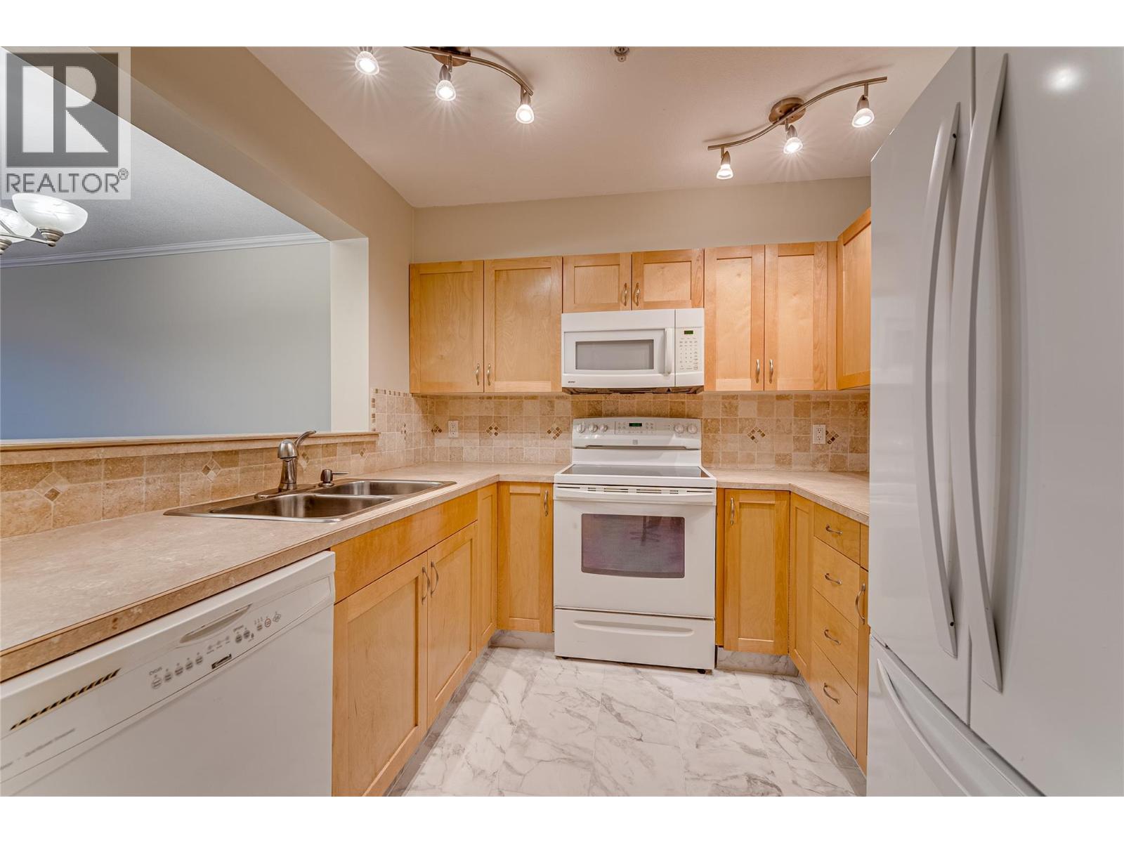 #102 3320 Centennial Drive - 9