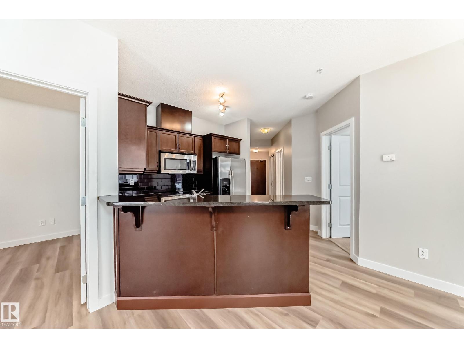 #103 7907 109 ST NW - 12