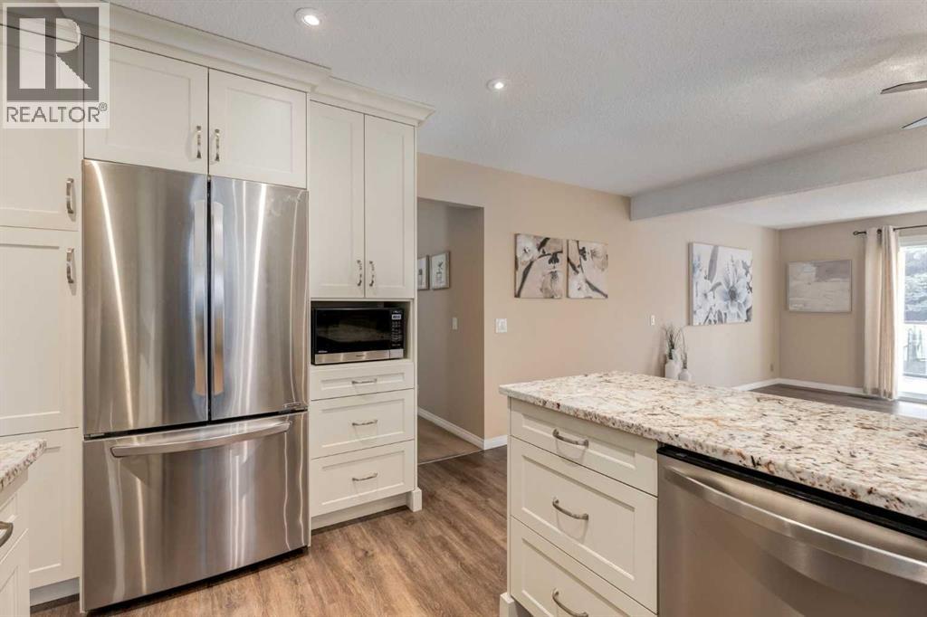 Single Family House Bungalow for Sale in  Hawkcliff Way NW Hawkwood Calgary 