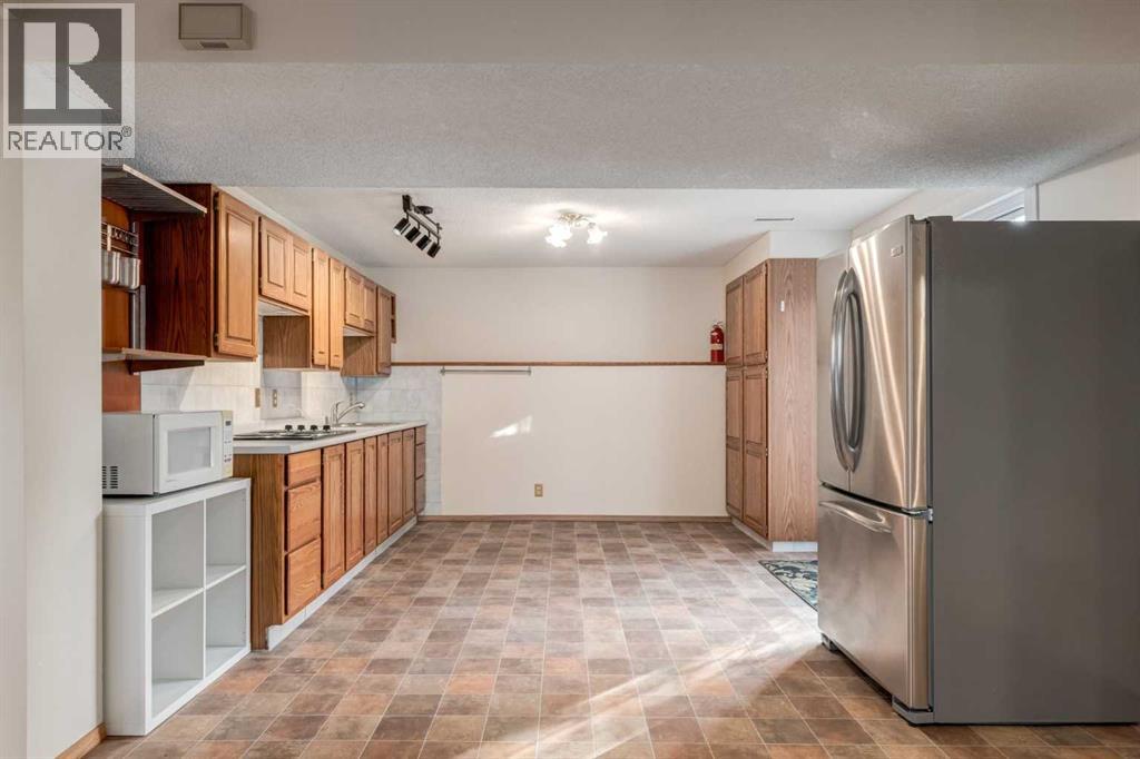 Single Family House Bungalow for Sale in  Hawkcliff Way NW Hawkwood Calgary 