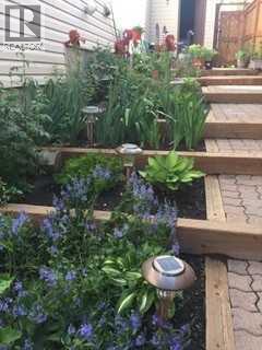 Single Family House Bungalow for Sale in  Hawkcliff Way NW Hawkwood Calgary 