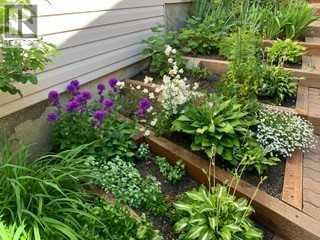 Single Family House Bungalow for Sale in  Hawkcliff Way NW Hawkwood Calgary 