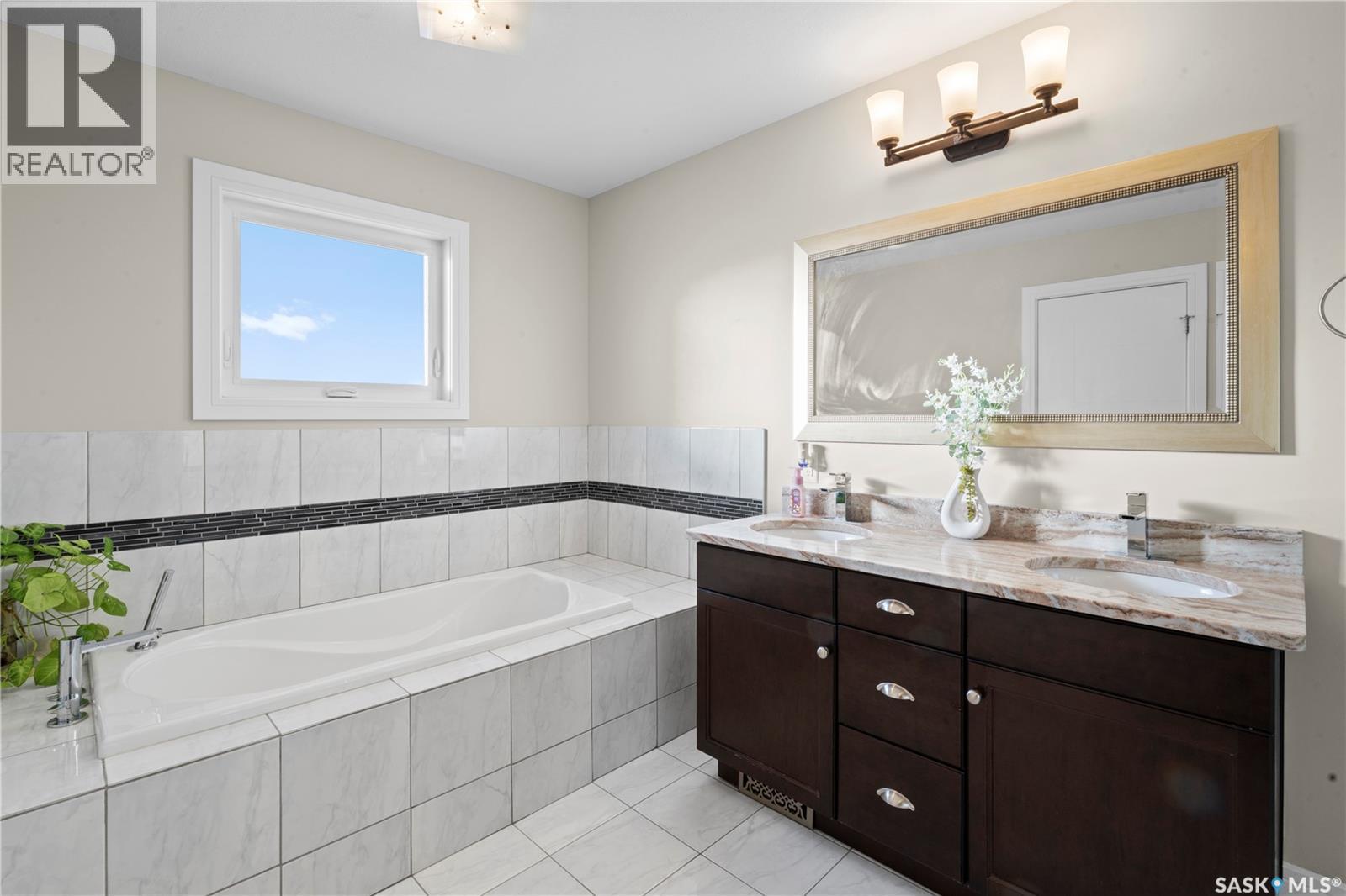 Single Family House Bi-level for Sale in  Evergreen BOULEVARD Saskatoon 