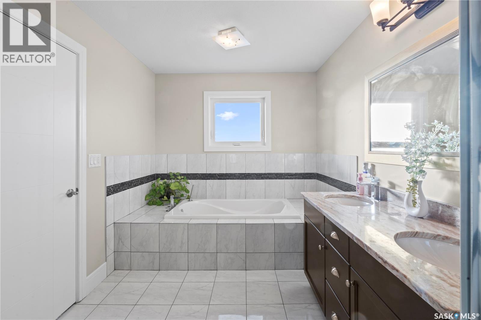 Single Family House Bi-level for Sale in  Evergreen BOULEVARD Saskatoon 