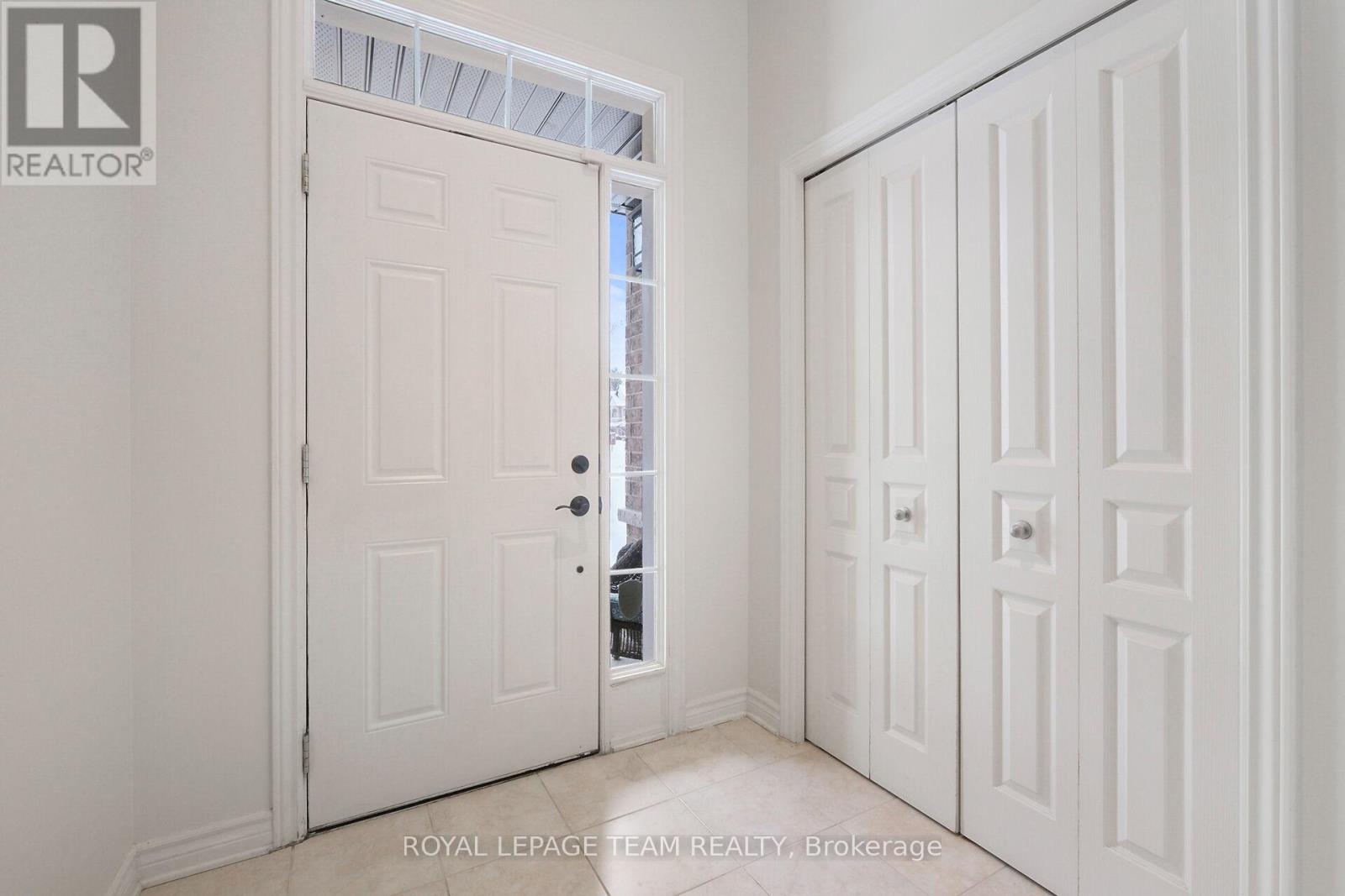 Spacious tiled Foyer with large closet.