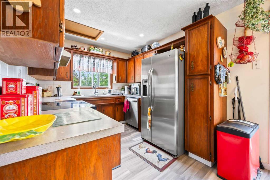 Single Family House 4 Level for Sale in  Taraglen Place NE Taradale Calgary 