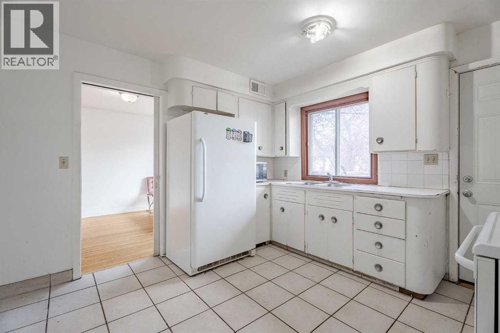 Single Family House 4 Level for Sale in  Capitol Hill Crescent NW Banff Trail Calgary 