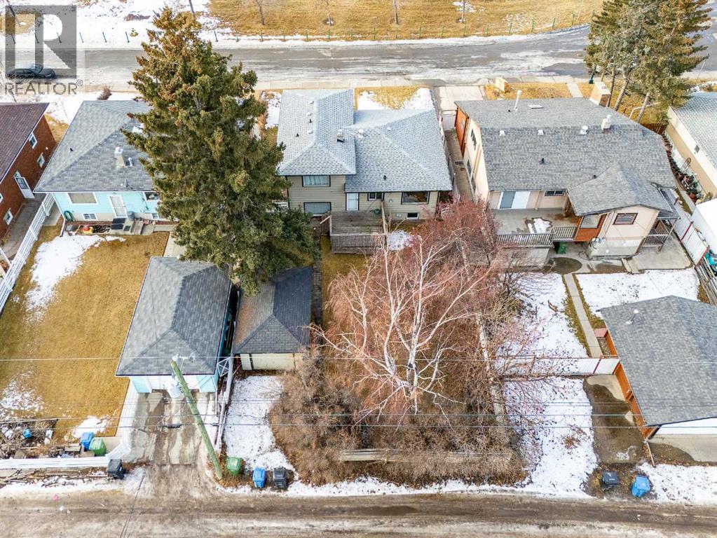 Single Family House 4 Level for Sale in  Capitol Hill Crescent NW Banff Trail Calgary 