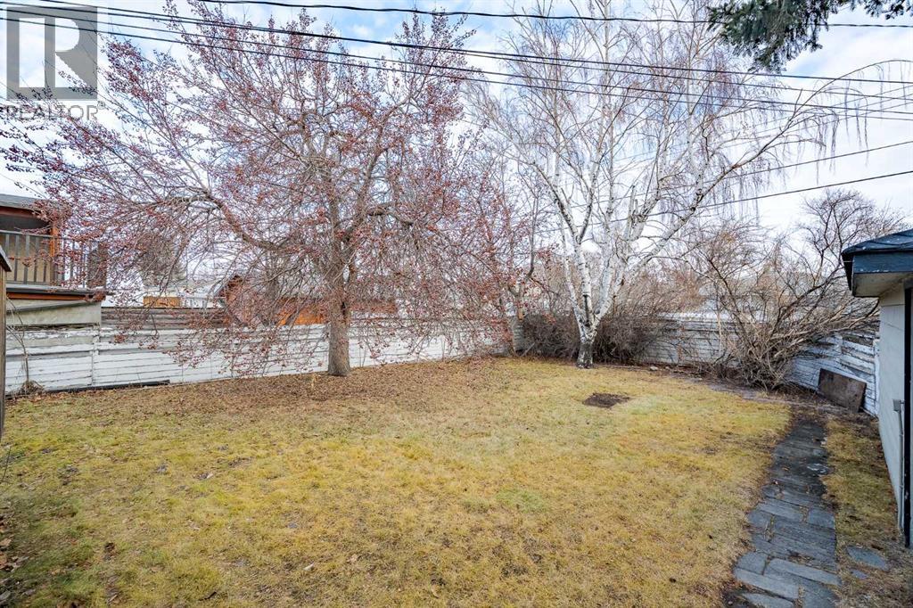 Single Family House 4 Level for Sale in  Capitol Hill Crescent NW Banff Trail Calgary 