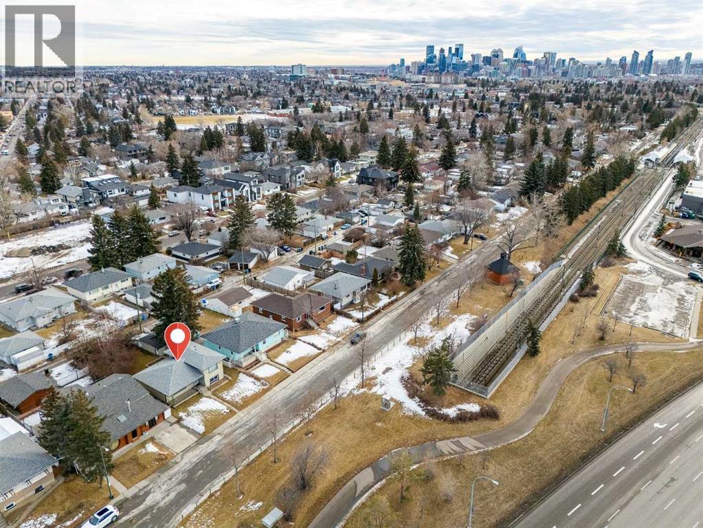 Single Family House 4 Level for Sale in  Capitol Hill Crescent NW Banff Trail Calgary 