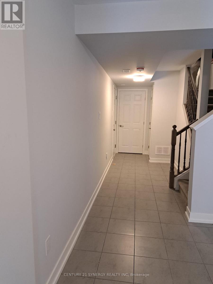 Foyer, leading to utility room/storage