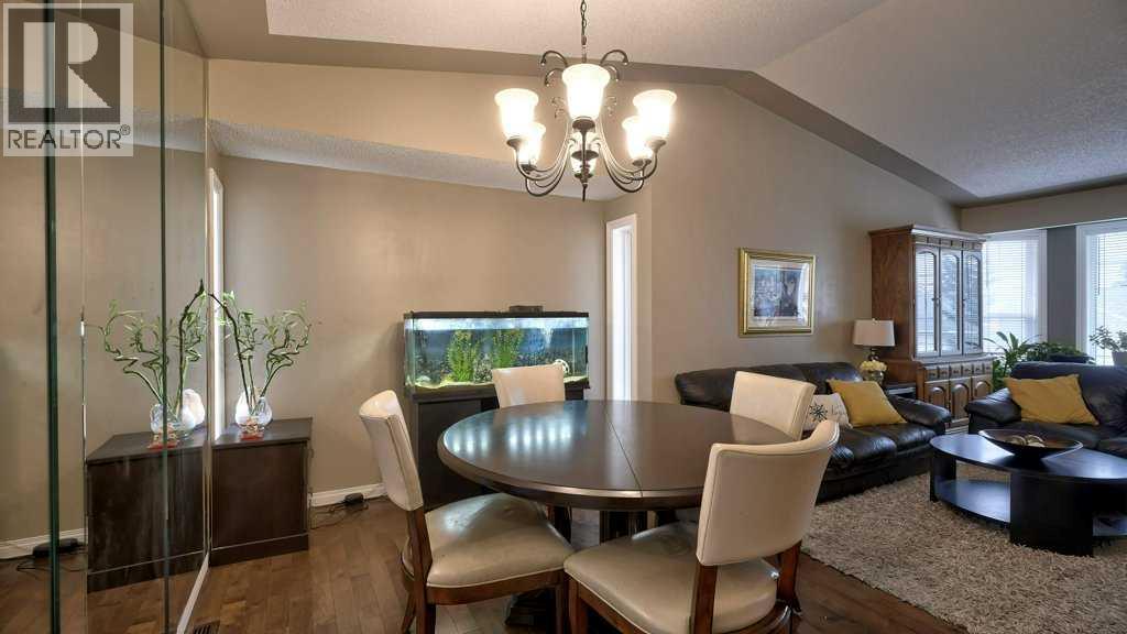 Single Family House Bungalow for Sale in  Sierra Morena Green SW Signal Hill Calgary 