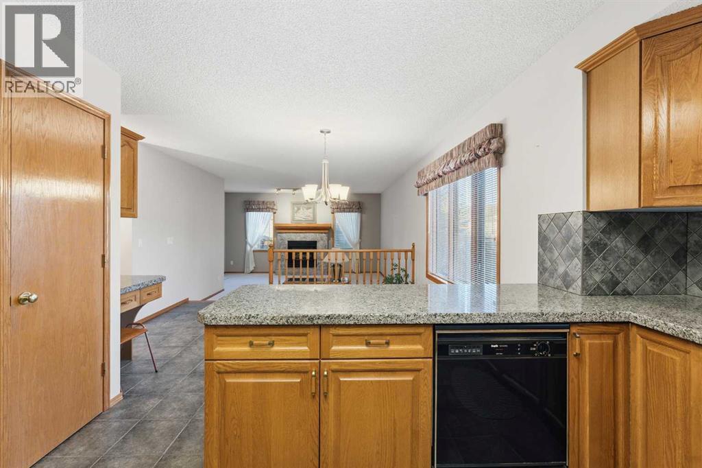 Single Family House Bi-level for Sale in  Sierra Morena Court SW Signal Hill Calgary 