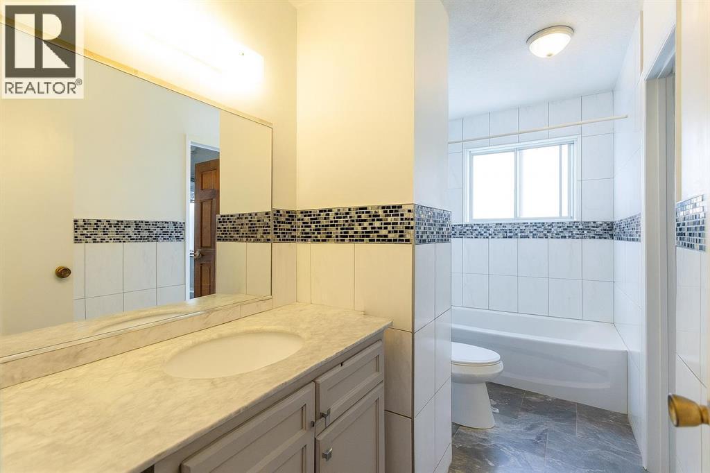 Single Family House 3 Level for Sale in  Hunterslea Crescent NW Huntington Hills Calgary 