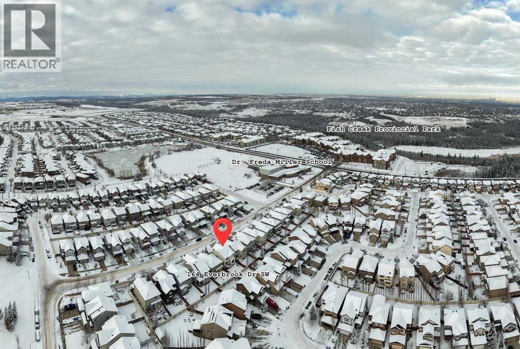 Single Family House for Sale in  Everbrook Drive SW Evergreen Calgary 