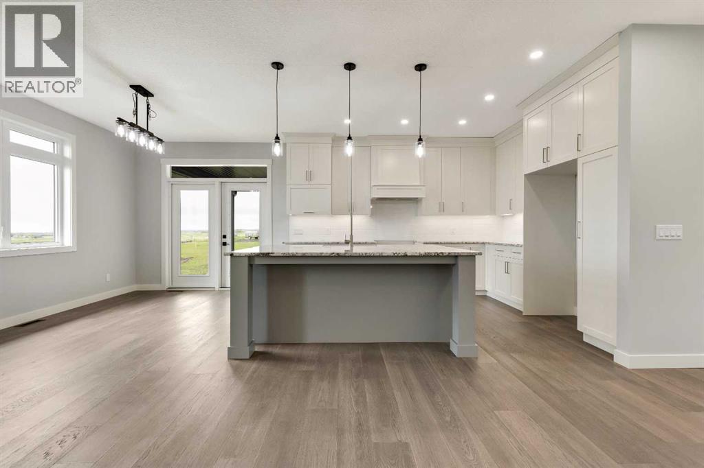 
          349062 Tamarack Drive East
            <br/>
            <span>Rural Foothills County</span>
            , 
            <span>AB</span>
             <span>T1S5B8</span>
         - Photo 11