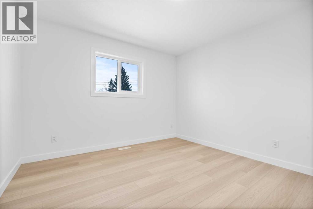 Multi-family House for Sale in   Avenue NW Bowness Calgary 