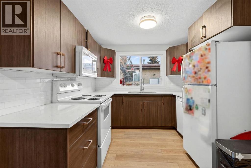 Multi-family House Bungalow for Sale in  &   Avenue SE Penbrooke Meadows Calgary 