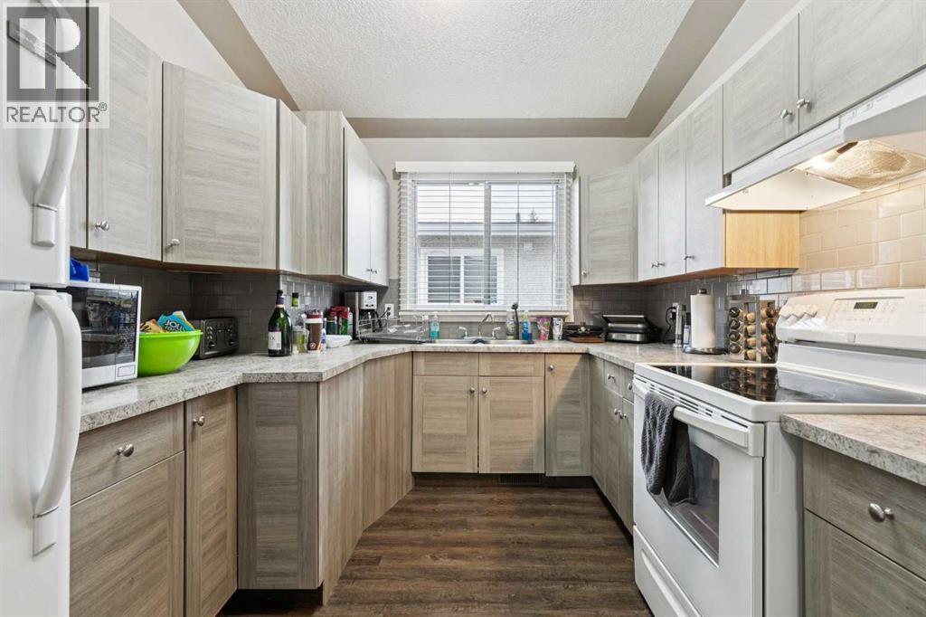 Multi-family House Bungalow for Sale in   Street SW Rosscarrock Calgary 