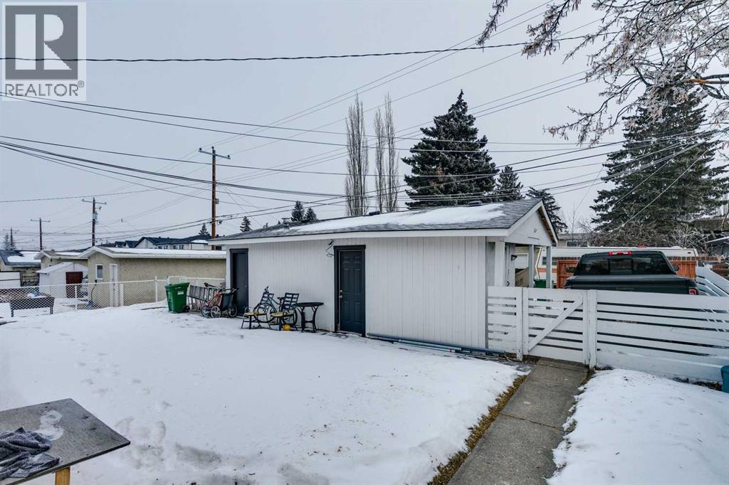 Multi-family House Bungalow for Sale in   Street SW Rosscarrock Calgary 