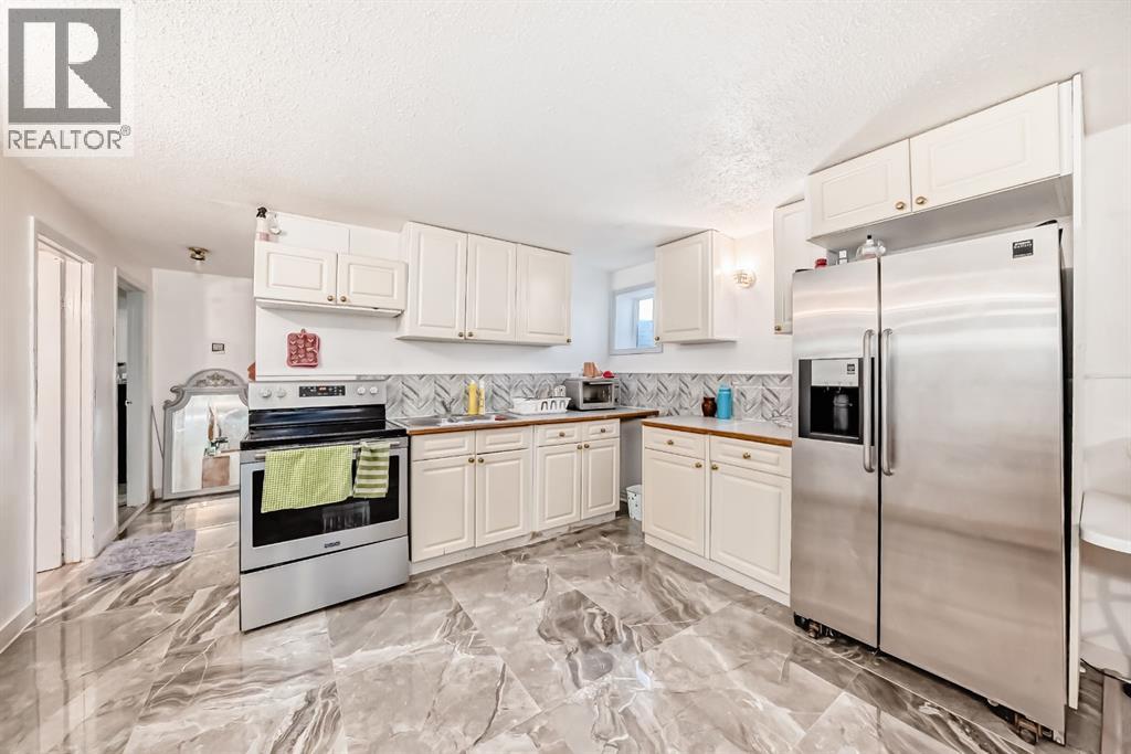 Single Family House Bungalow for Sale in  Malvern Place NE Marlborough Park Calgary 