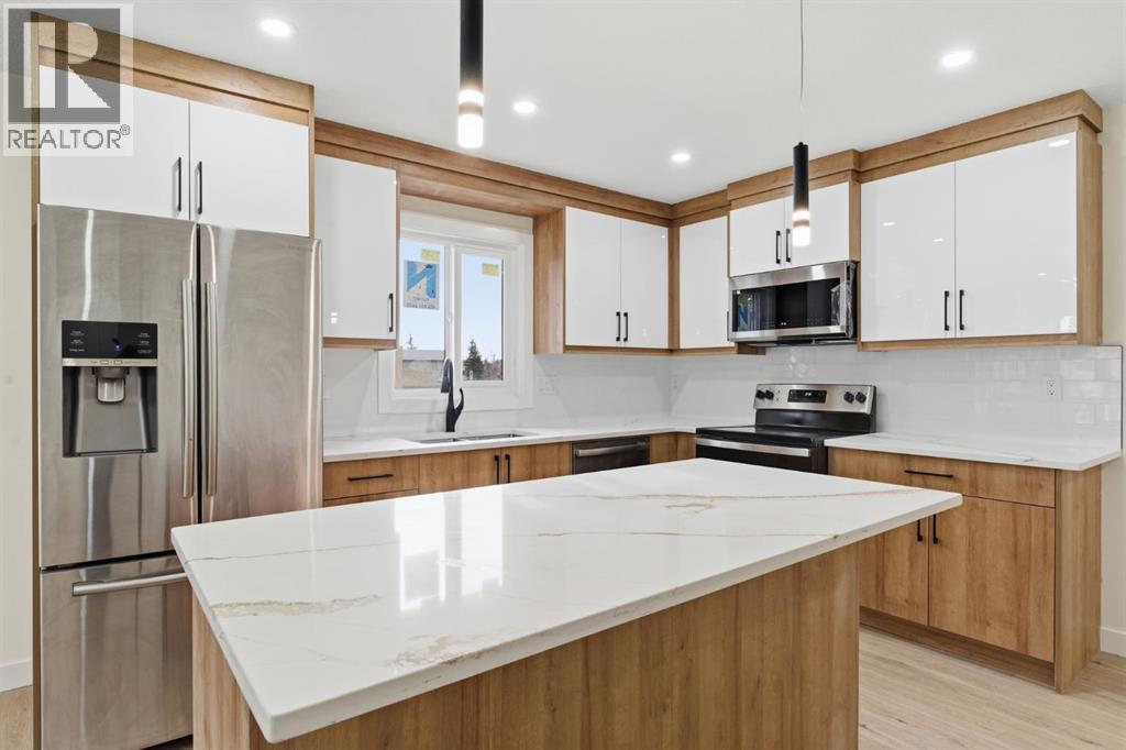 Single Family House Bungalow for Sale in  Del Monica Bay NE Monterey Park Calgary 