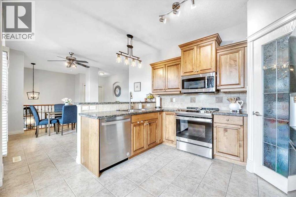 Single Family House Bi-level for Sale in  Discovery Woods Villas SW Discovery Ridge Calgary 