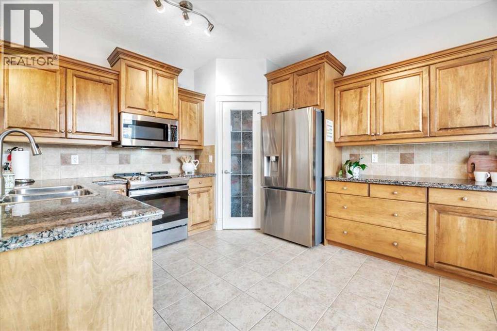 Single Family House Bi-level for Sale in  Discovery Woods Villas SW Discovery Ridge Calgary 