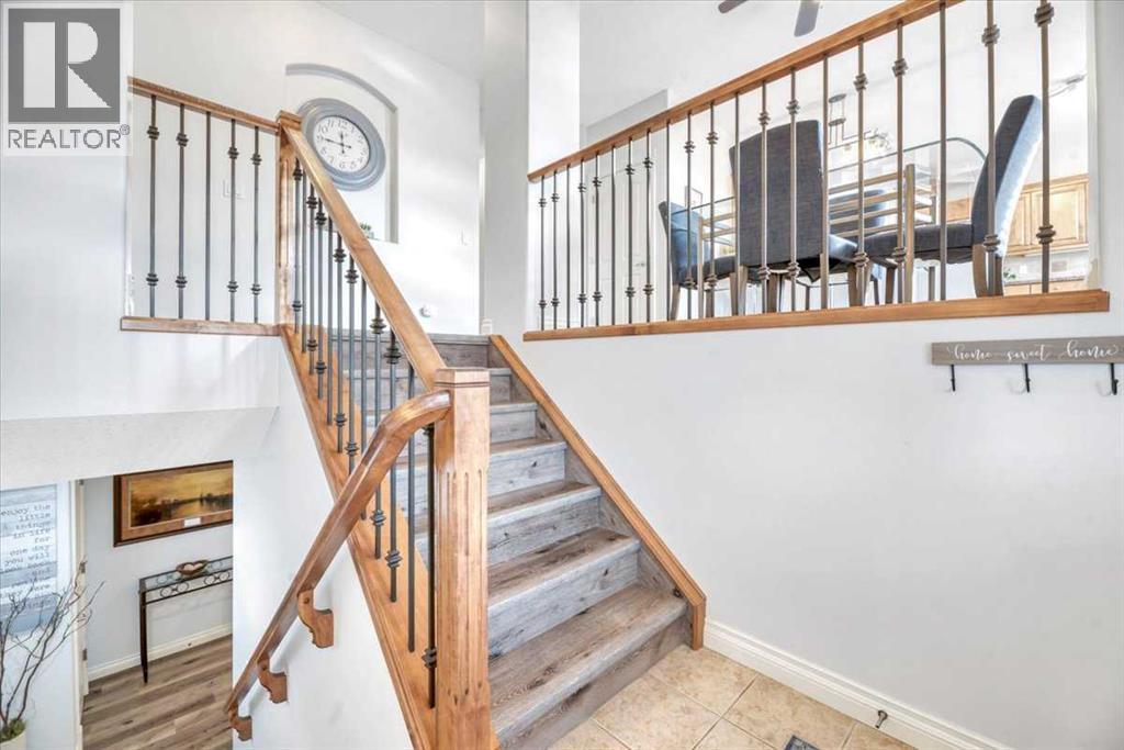 Single Family House Bi-level for Sale in  Discovery Woods Villas SW Discovery Ridge Calgary 