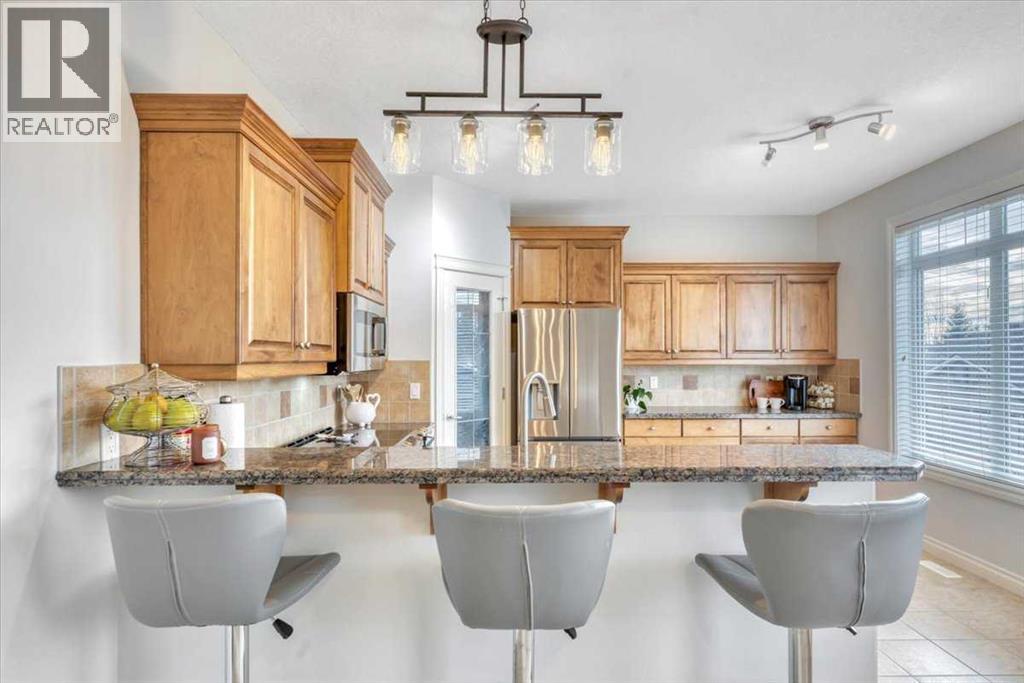 Single Family House Bi-level for Sale in  Discovery Woods Villas SW Discovery Ridge Calgary 