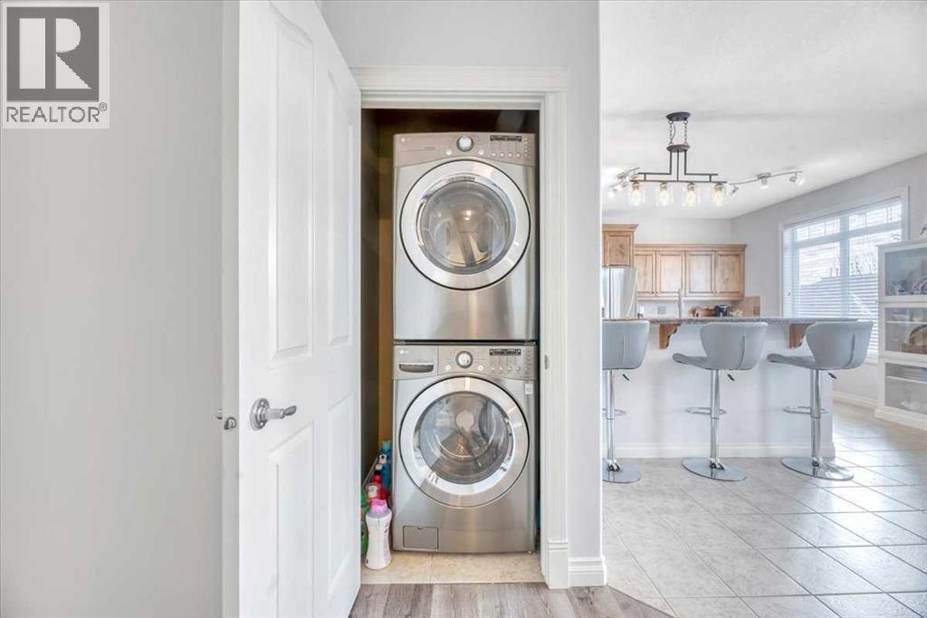 Single Family House Bi-level for Sale in  Discovery Woods Villas SW Discovery Ridge Calgary 