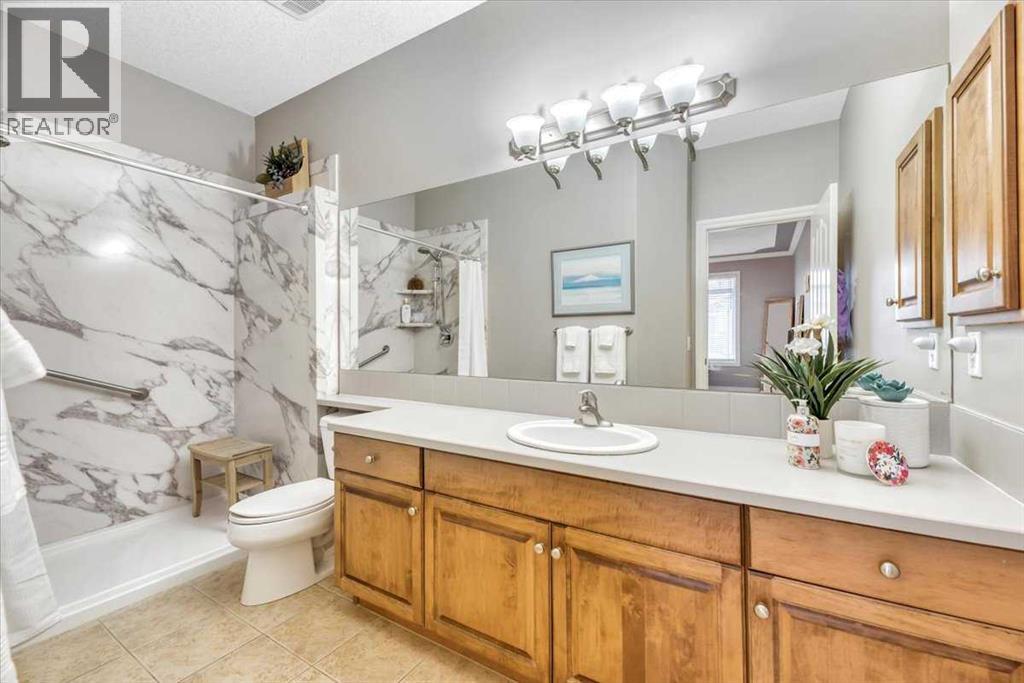 Single Family House Bi-level for Sale in  Discovery Woods Villas SW Discovery Ridge Calgary 