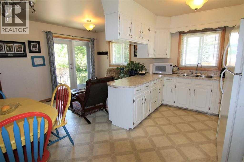 Single Family House for Sale in   Avenue NW Bowness Calgary 