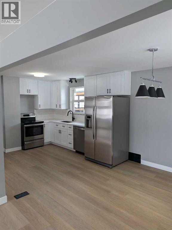 Single Family House Bungalow for Sale in   Avenue S Glendale Lethbridge 