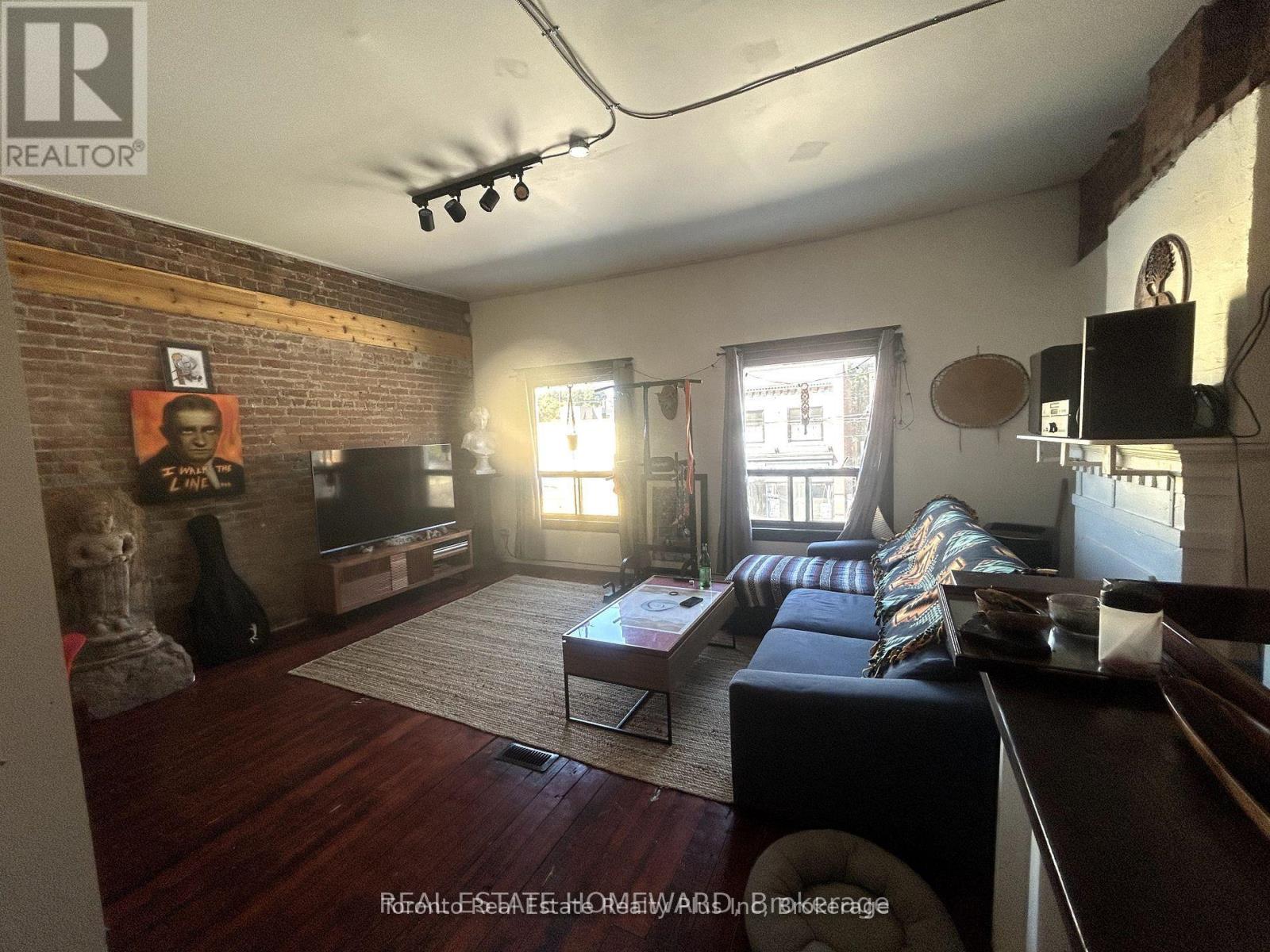 Listing photo of A - 1297 GERRARD STREET E