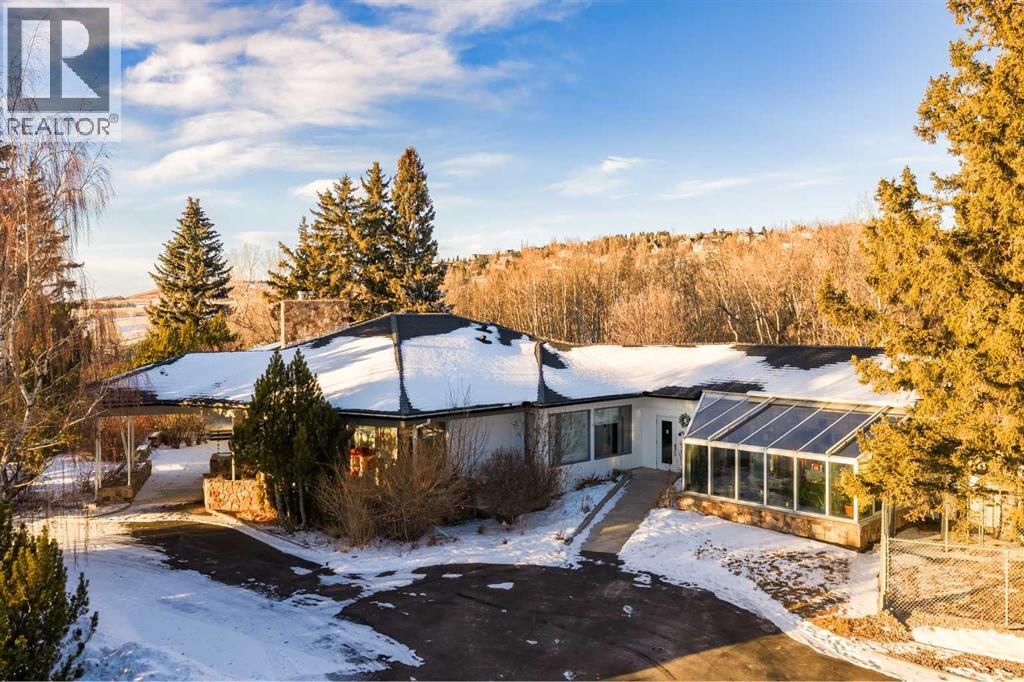 Single Family House Bungalow for Sale in  Slopeview Drive SW Springbank Hill Calgary 