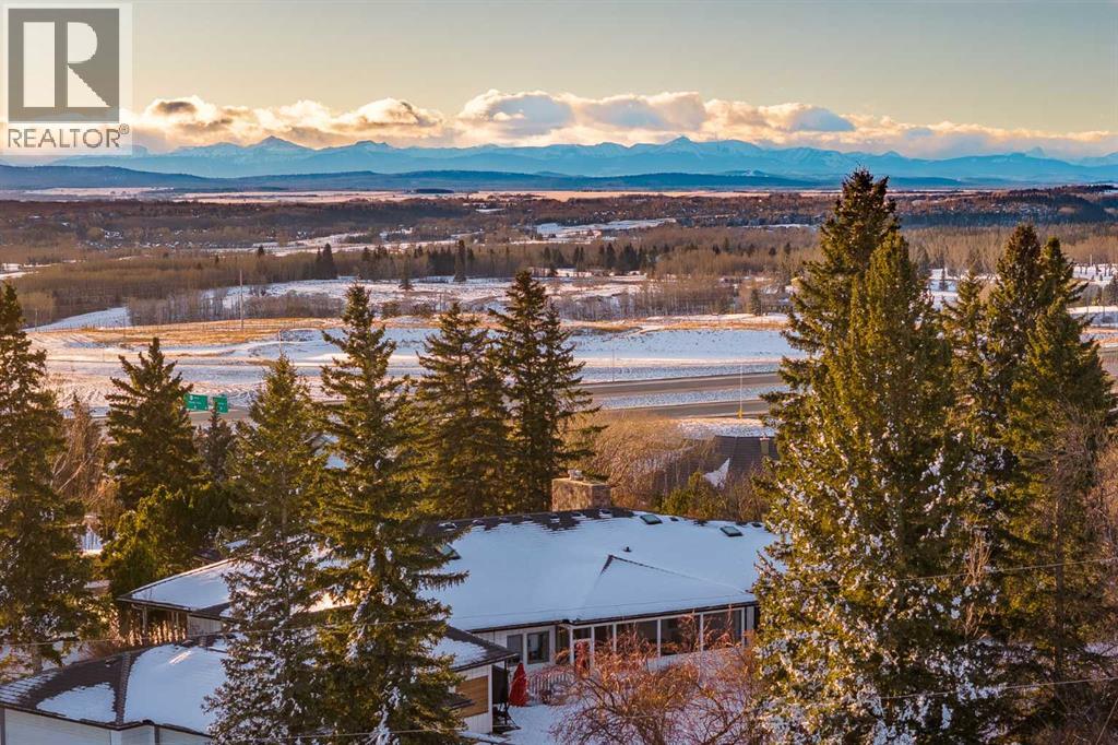 Single Family House Bungalow for Sale in  Slopeview Drive SW Springbank Hill Calgary 