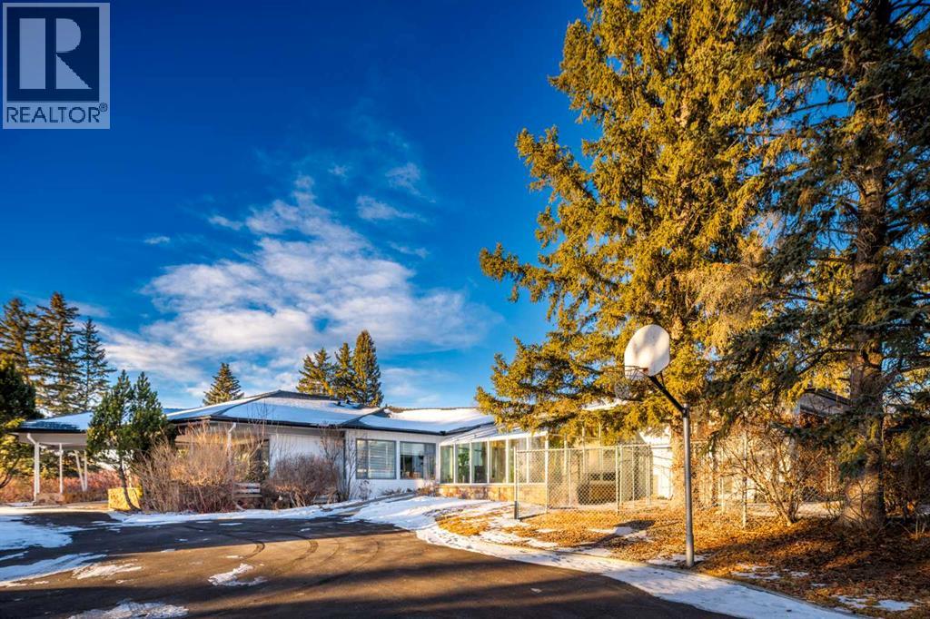 Single Family House Bungalow for Sale in  Slopeview Drive SW Springbank Hill Calgary 