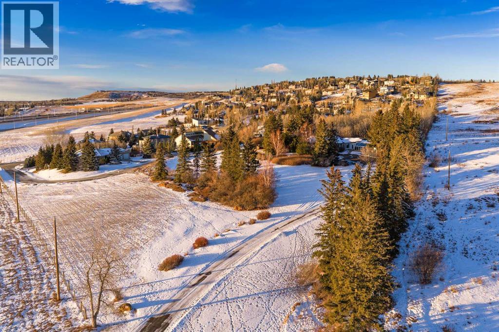 Single Family House Bungalow for Sale in  Slopeview Drive SW Springbank Hill Calgary 