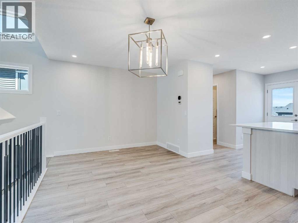 Single Family House 5 Level for Sale in  Aquila Way NW Glacier Ridge Calgary 